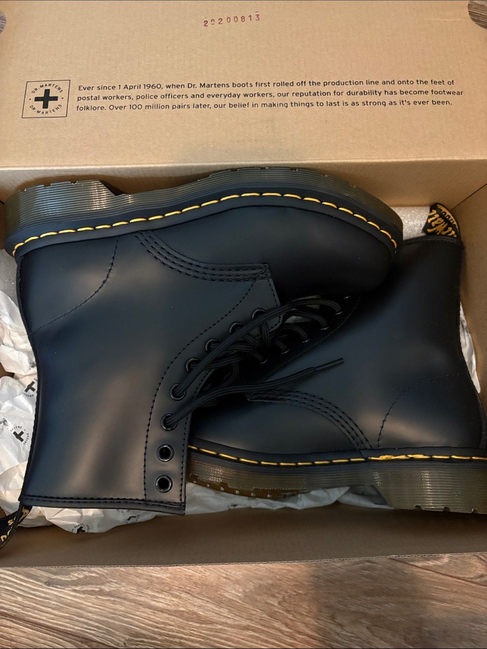 Dr. Martens Black Leather 8-Eye Boots with Yellow Stitching